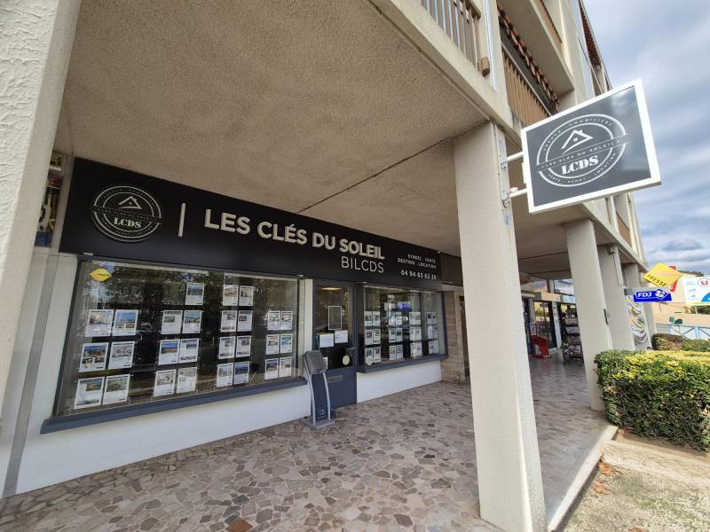 enseigne lumineuse et drapeau lumineux double face